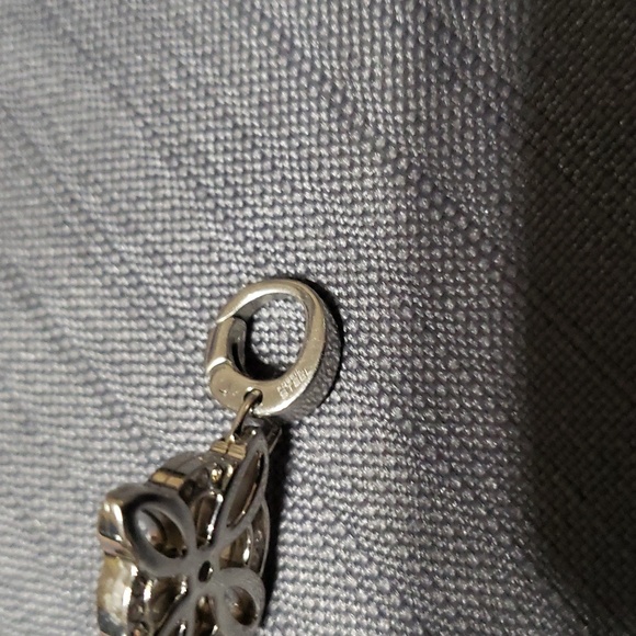 FOSSIL flower silvertone steel charm or pendant - Picture 3 of 3